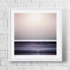 The Quiet Between — abstract photography by Andrew Conway-Hyde, London Fine Art Gallery Ltd. A pale rose-grey sky rests above a narrow band of dark, violet-toned water.